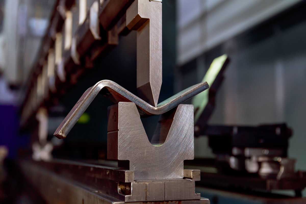 Precision metal bending process using CNC fabrication equipment in Boyd, TX