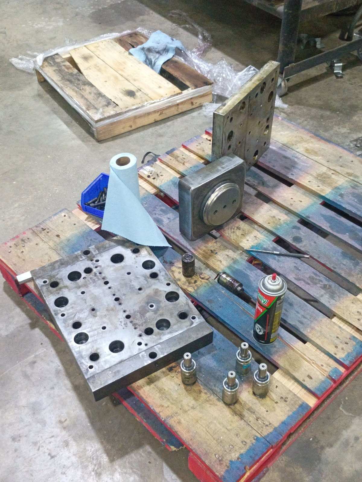 Custom machined parts receiving protective coating at Boyd, TX machine shop